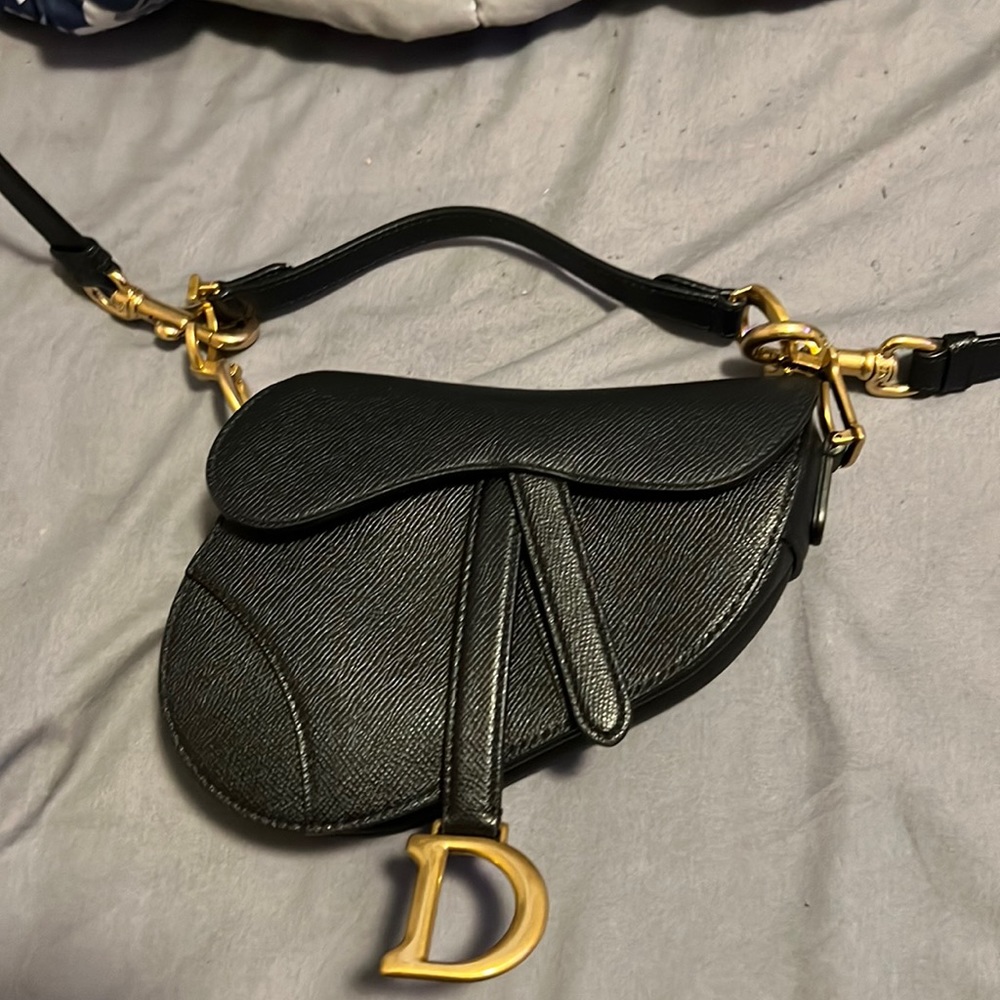 Christian Dior Saddle Micro bag in black leather with gold detail